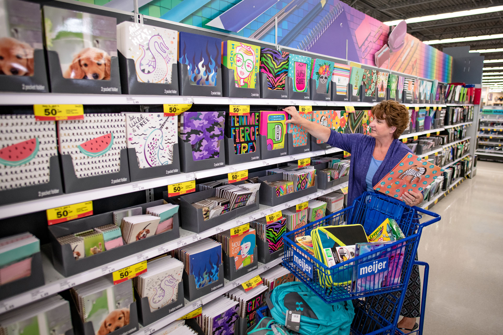 Woman looking at school supplies